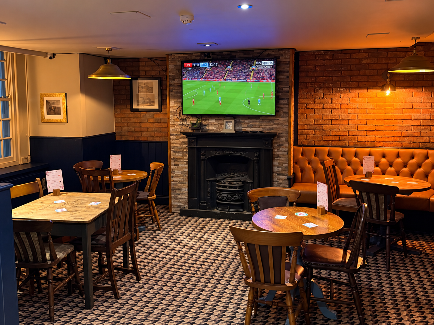 Turf Hotel pub showing live football